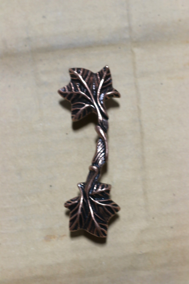 NEW SET OF CABINET HANDLES MAPLE LEAF BRONZE PRICE:10 FOR $10.00   RV Interiors 